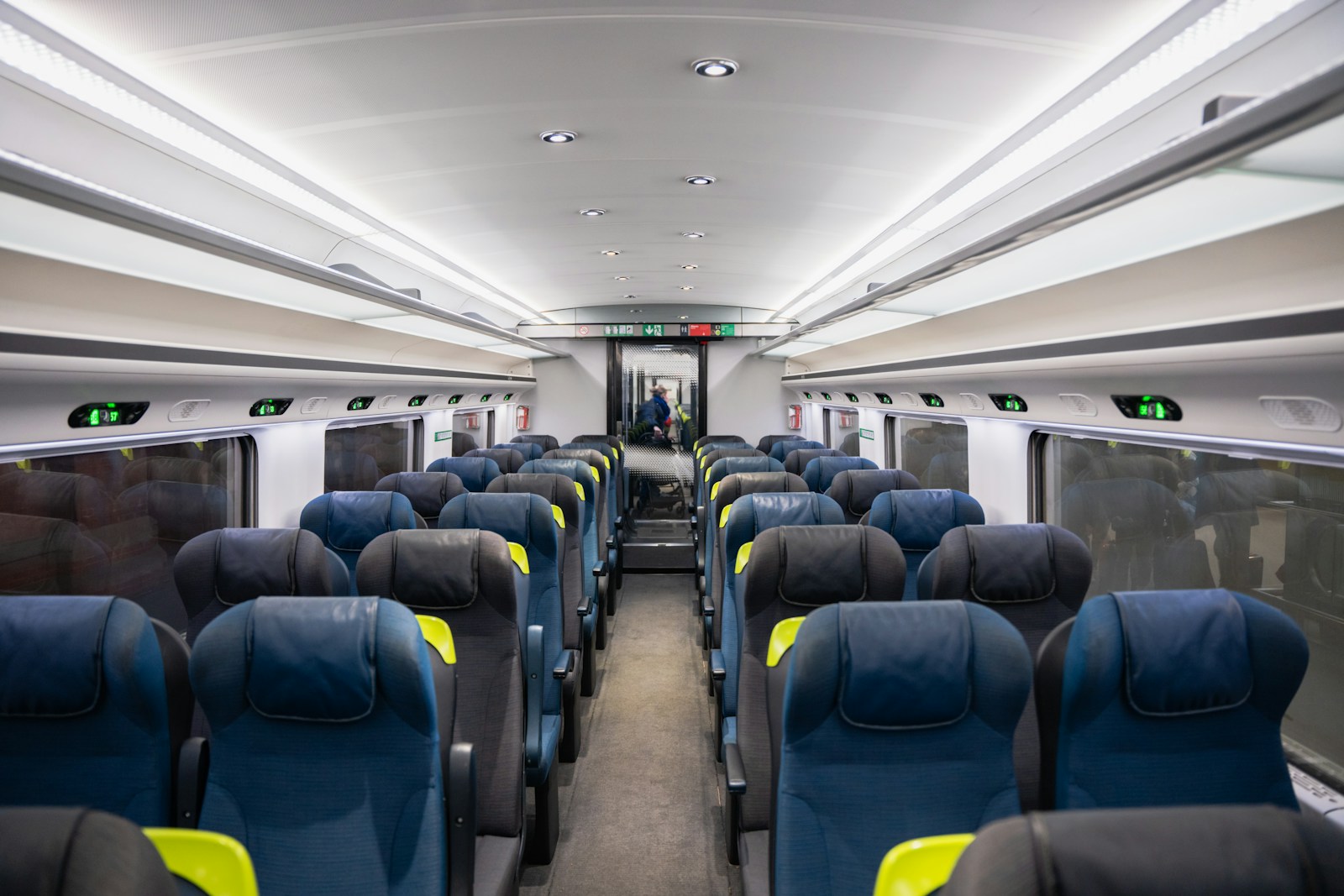 Interior of a European sleeper train cabin with empty bunk seats